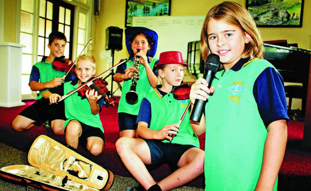 Alex Hutley, Mitchell Clifford, Joy DeCourcy, Phoenix Eaton and Nella Ryan rehearse their busking act.